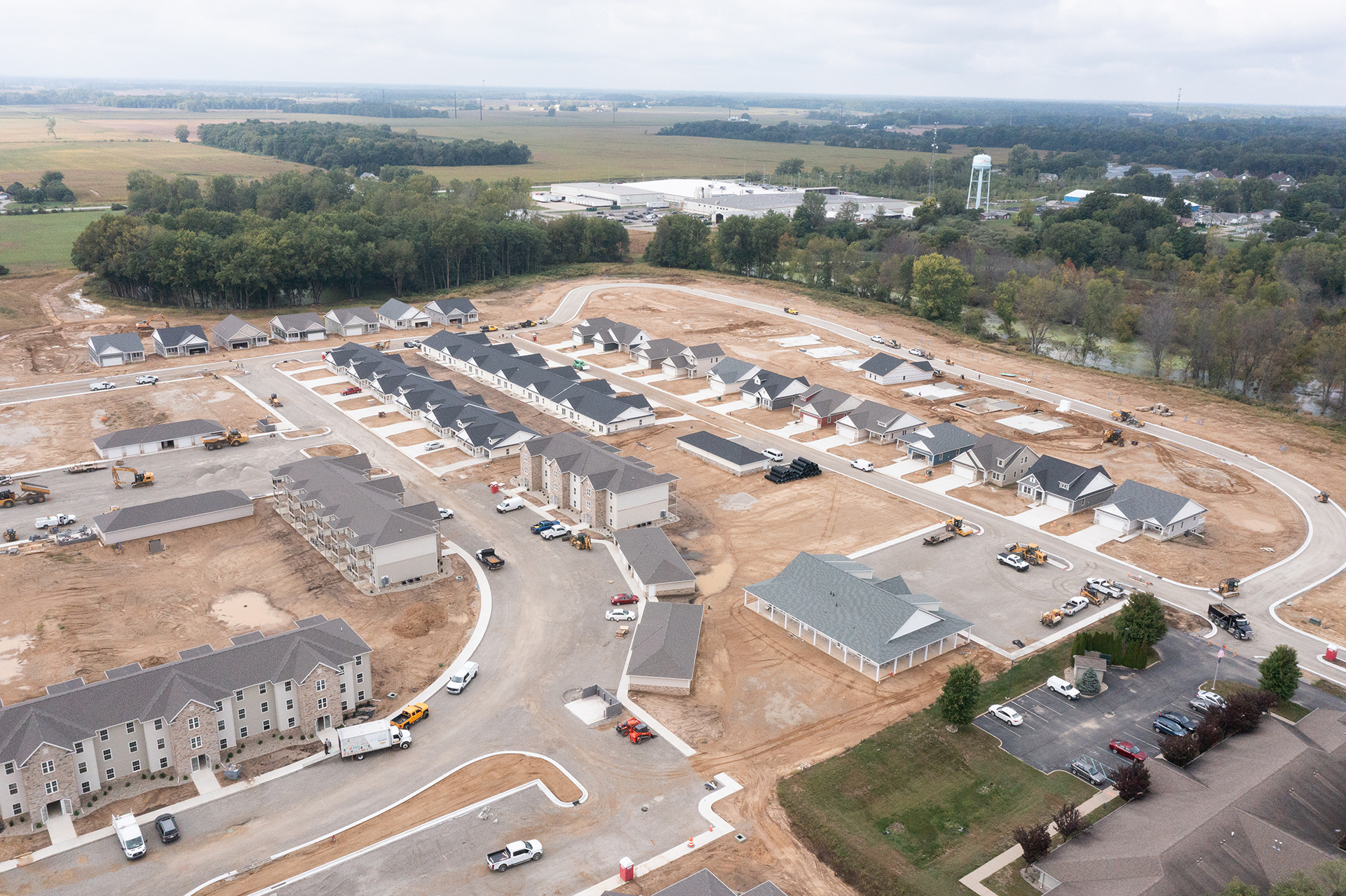 aerial view of houses and apartment buildings being built